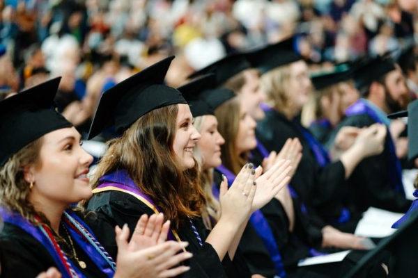 Students celebrating at graduation